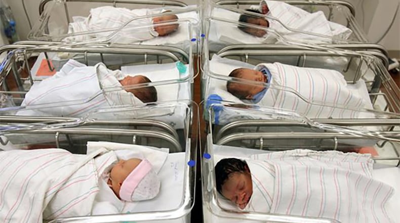 Local hospitals and agencies often need volunteers to help with babies and children whose parents can't care for them. AJC FILE