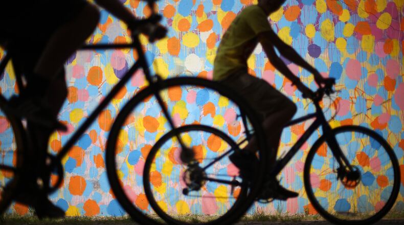Bicyclists cruise along the Beltline under Virginia Avenue. Ben Gray / bgray@ajc.com