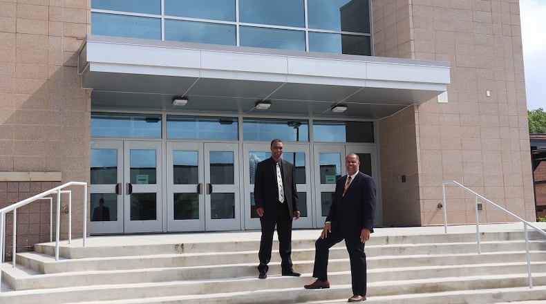 Campbell girls coach Randy McClure (left) and boys coach James Gwyn have been honored in the naming of Campbell's Gwyn-McClure Gymnasium, a 3,500-seat facility that opened in 2917-18.