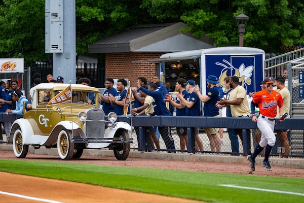 Georgia Tech baseball great Mark Teixeira rides in the rumble seat of the Ramblin' Wreck on Saturday, May 20, 2023. Tech retired Teixeira's jersey No. 23 in a ceremony before the Yellow Jackets played Virginia at Russ Chandler Stadium. (Photo by Eldon Lindsay/Georgia Tech Athletics)