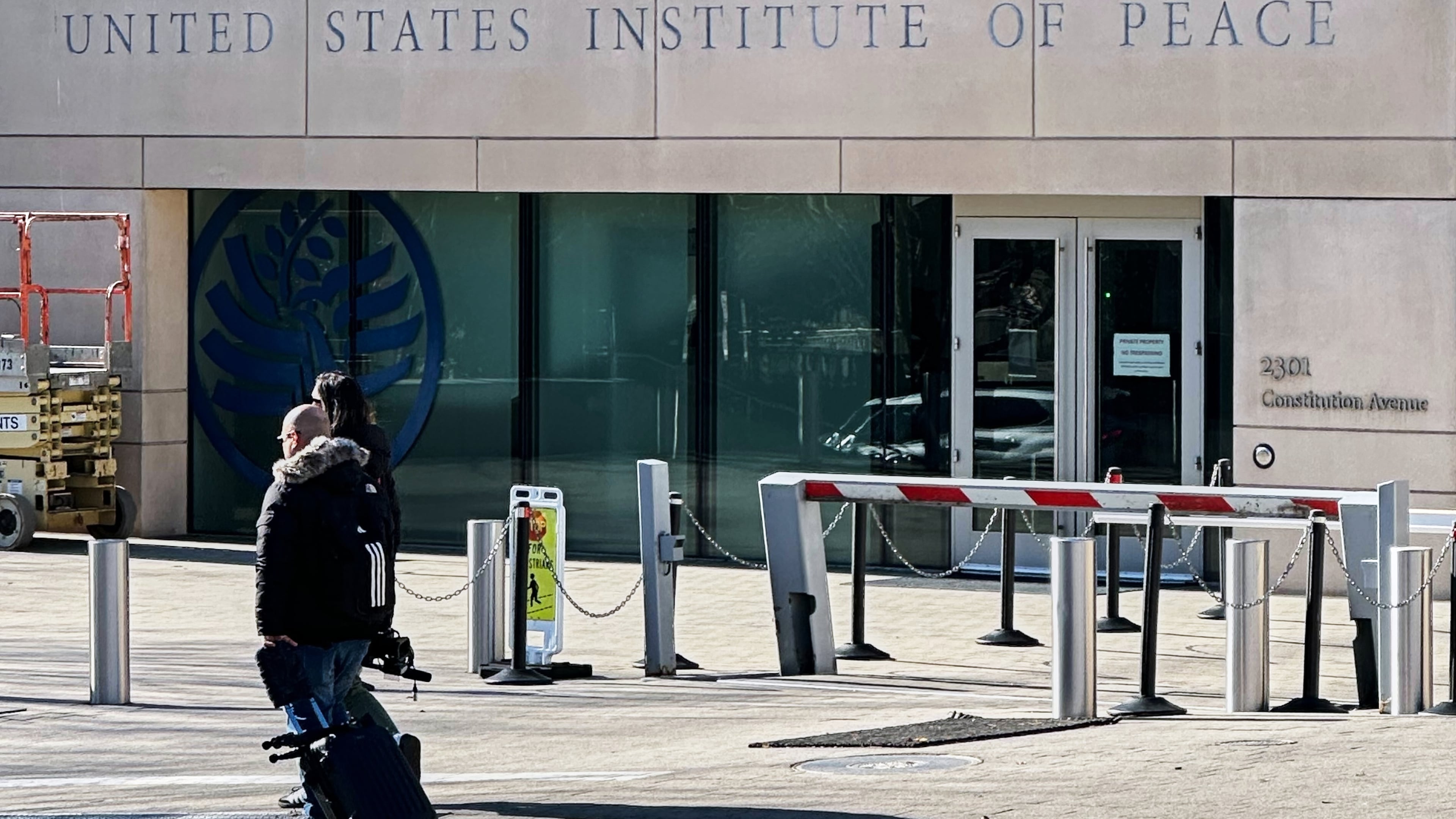 President Donald Trump's name is seen on the United State Institute of Peace building, Wednesday, Dec. 3, 2025 in Washington. (AP Photo/Matthew Lee)