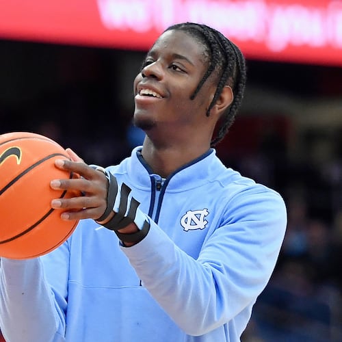 FILE - North Carolina forward Caleb Wilson (8) shoots before an NCAA college basketball game against Syracuse, Saturday, Feb. 21, 2026, in Syracuse, N.Y. (AP Photo/Adrian Kraus,File)