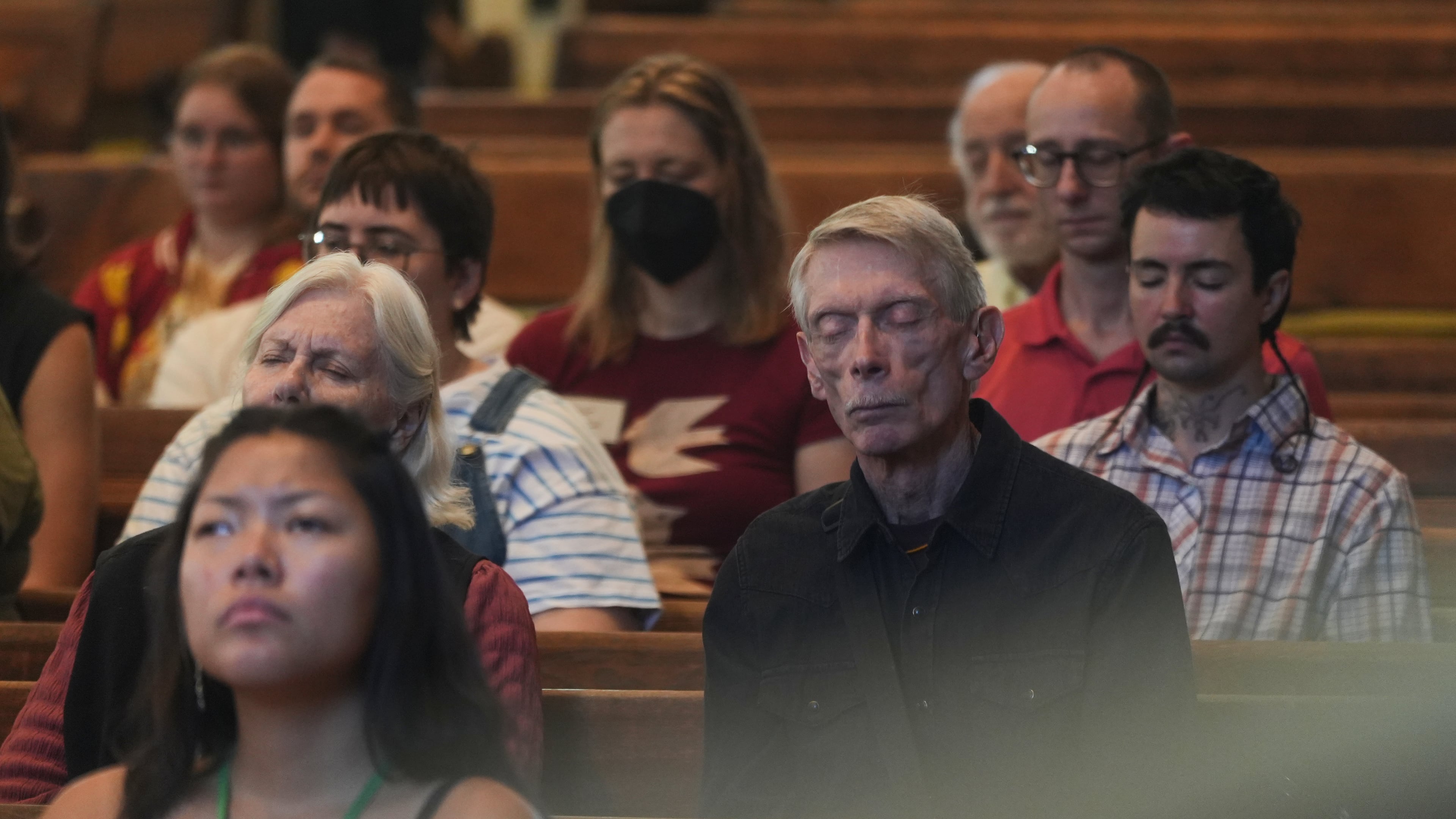 Quakers attend a Sunday worship in the historic West Room of the Arch Street Meeting House in Philadelphia on Oct. 5, 2025. (AP Photo/Luis Andres Henao)