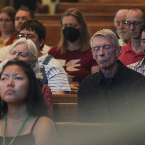 Quakers attend a Sunday worship in the historic West Room of the Arch Street Meeting House in Philadelphia on Oct. 5, 2025. (AP Photo/Luis Andres Henao)