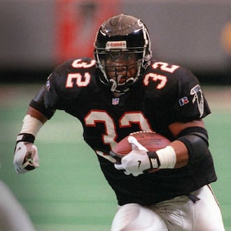 Running back Jamal Anderson, seen playing for the Falcons in 1996, was arrested Wednesday in Los Angeles. (AJC file)