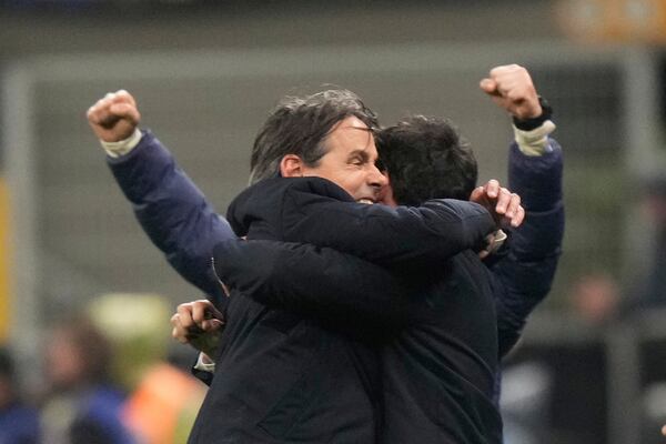 Inter Milan's head coach Simone Inzaghi celebrates at the end of the Champions League quarterfinal second leg soccer match between Inter Milan and Bayern Munich at the San Siro stadium in Milan, Italy, Wednesday, April 16, 2025. (AP Photo/Luca Bruno)