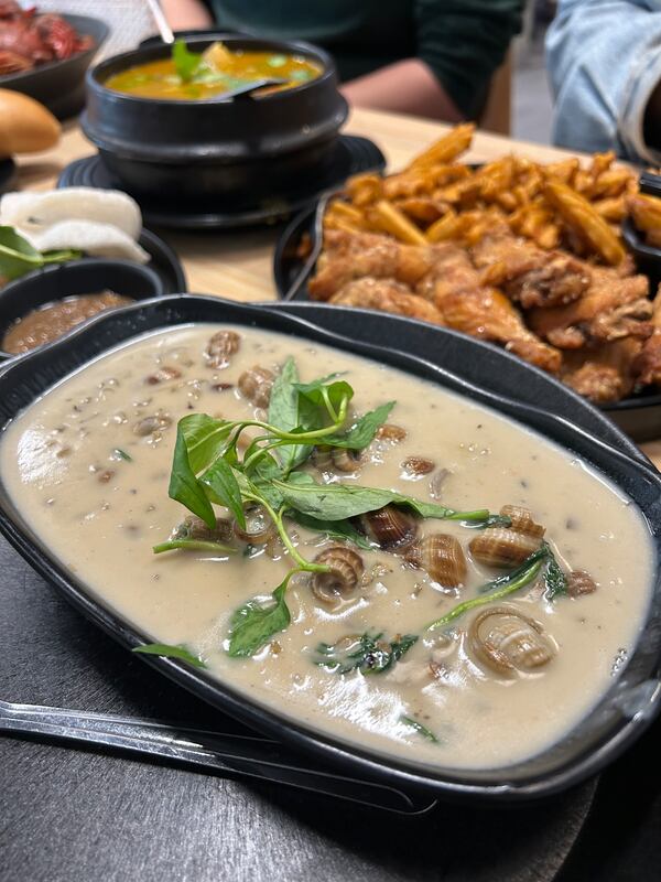 Periwinkle snails in lemongrass coconut sauce at Saigon District.