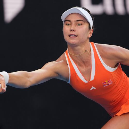 Iva Jovic of the U.S. plays a forehand return to Jasmine Paolini of Italy during their third round match at the Australian Open tennis championship in Melbourne, Australia, Friday, Jan. 23, 2026. (AP Photo/Aaron Favila)