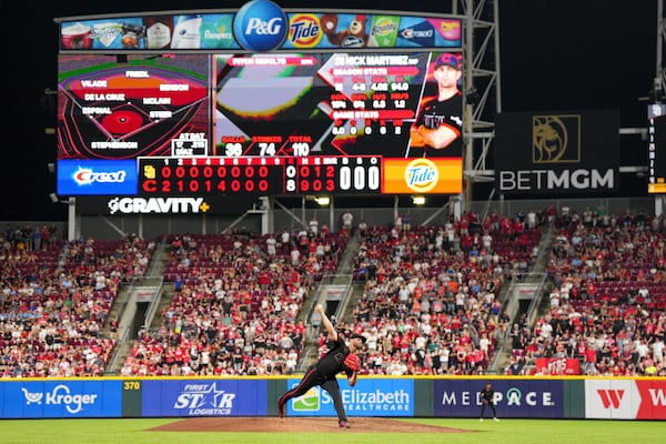 Cincinnati Reds pitcher Nick Martinez throws during the ninth inning of a baseball game against the San Diego Padres, Friday, June 27, 2025, in Cincinnati. (AP Photo/Jeff Dean)