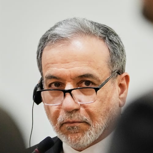 Iranian Foreign Minister Abbas Araghchi listens to his Iraqi counterpart Fouad Hussein during a news conference after a meeting at the foreign ministry in Baghdad, Iraq, Sunday, June 28, 2026. (AP Photo/Hadi Mizban)
