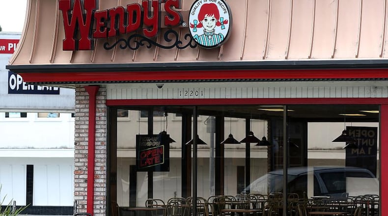 Customers in a Wendy's parking lot were shot at by an employee after an argument broke out at the Charlotte, North Carolina, restaurant, police said.