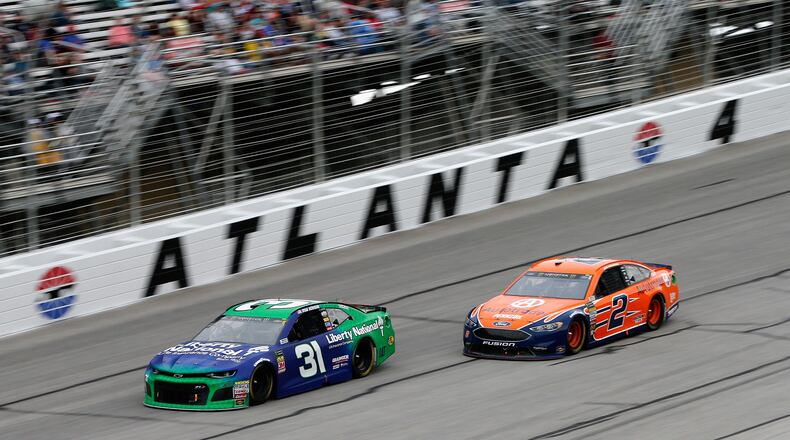Driver Ryan Newman leads Brad Keselowski (2) during the Monster Energy NASCAR Cup Series Folds of Honor QuikTrip 500 at Atlanta Motor Speedway on February 25, 2018 in Hampton, Ga.
