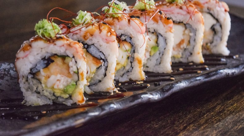 Monkey 68's Rolls Royce sushi roll highlights lobster tempura and snow crab leg with chili threads and sweet aioli. / Photo by Tori Allen PR