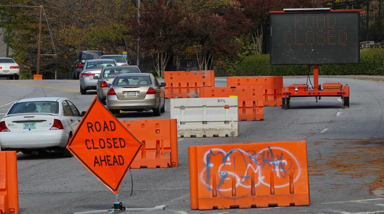 John Spink, jspink@ajc.com