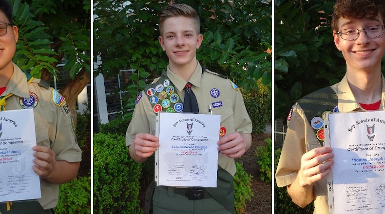 The Northern Ridge Boy Scout District (Cities of Roswell, Alpharetta, John’s Creek, Milton) is proud to announce its newest Eagle Scouts, who passed their Board of Review, at the Kiddos Clubhouse in Alpharetta, on June 24 from left:
Justin Jung, of Troop 629, sponsored by Mt. Pisgah United Methodist Church, whose project was the design and construction of a 2 foot tall by 40 foot retaining wall at Autry Mill Nature Preserve and Heritage Center
Luke Douglas, of Troop 10, sponsored by St. Benedicts Catholic Church, whose project was the design and construction of three picnic benches for Midway Community Church
Thomas Miller, of Troop 629, sponsored by Mt. Pisgah United Methodist Church, whose project was refurbishing the outdoor eating area of Taylor Road Middle School by replacing, sanding all the wood and re-staining of the existing picnic tables and landscaping.