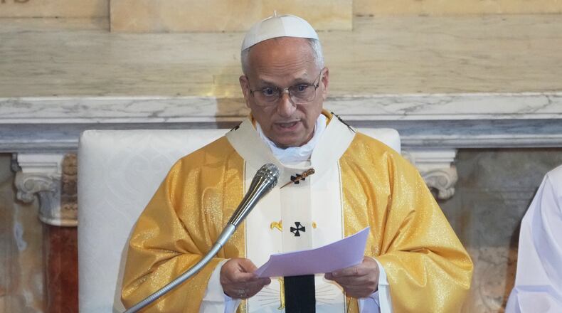 Pope Leo XIV delivers his speech as he celebrates a Mass in the Saint Augustine Basilica in Annaba, Algeria, Tuesday, April 14, 2026, on the second day of an 11-day apostolic journey to Africa. (AP Photo/Andrew Medichini)