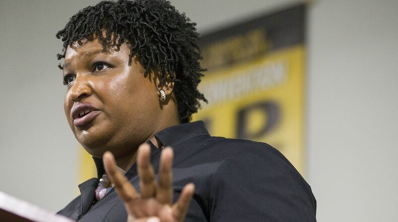 Stacey Abrams speaks to a crowd at a campaign event. The Democratic candidate for governor created two nonprofit foundations that helped to establish her as a major political figure in Georgia.