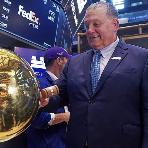 FedEx Freight Holding Company President & CEO John A. Smith rings a ceremonial bell on the floor of the New York Stock Exchange as his company begins trading, Monday, June 1, 2026. (AP Photo/Richard Drew)