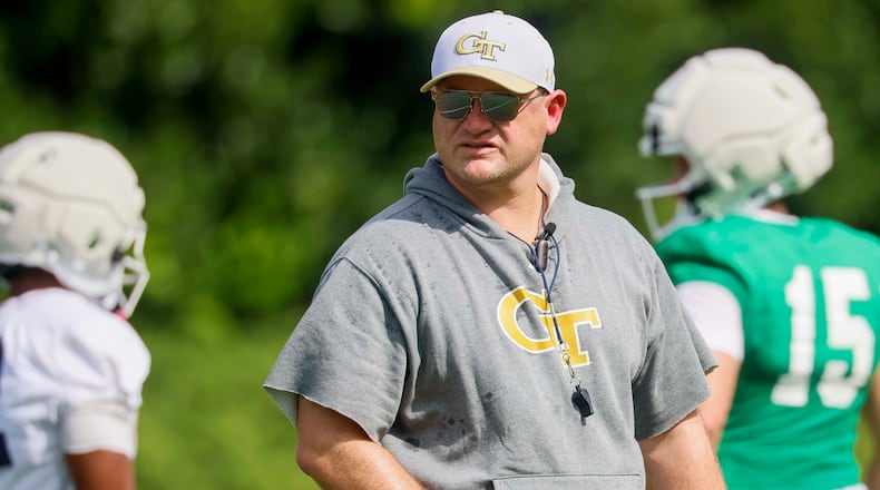 Georgia Tech head coach Brent Key observes the offensive team practicing on the field during the first day of football training at Rose Bowl Field and the Mary and John Brock Football Practice Facility, Monday, August 3, 2026, in Atlanta. (Miguel Martinez/AJC)