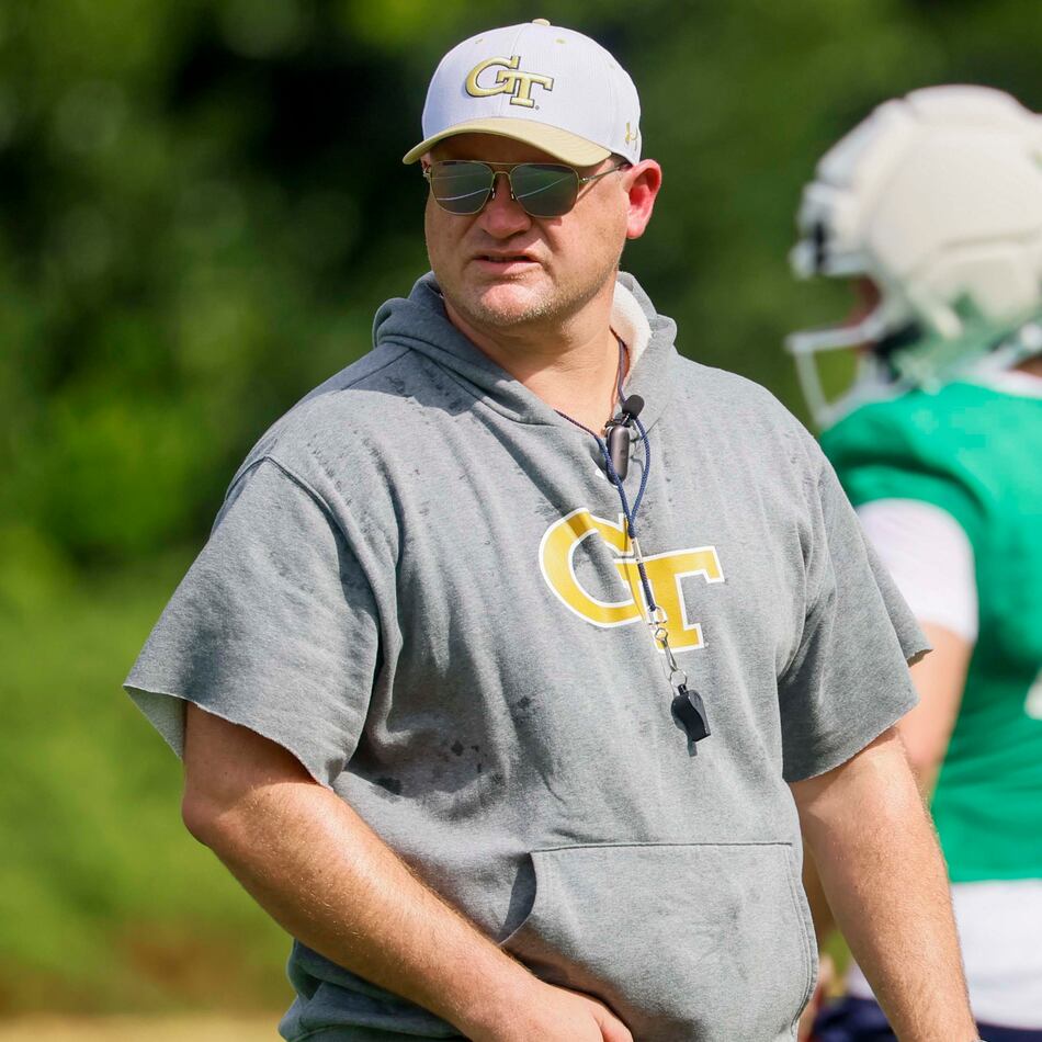 Georgia Tech head coach Brent Key observes the offensive team practicing on the field during the first day of football training at Rose Bowl Field and the Mary and John Brock Football Practice Facility, Monday, August 3, 2026, in Atlanta. (Miguel Martinez/AJC)