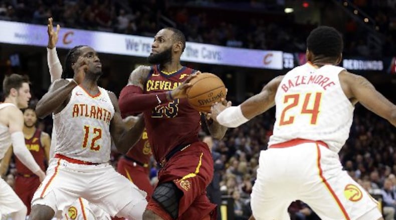 The Hawks conquered LeBron James and the Cavs but upset victories by the Kings and Mavs kept them at the bottom of the lottery watch standings. (AP Photo)