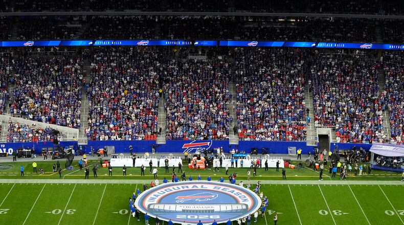 An inuagural season sign is shown on the field at Highmark Stadium before an NFL football game between the Buffalo Bills and Detroit Lions in Orchard Park, N.Y., Thursday, Sept. 17, 2026. (AP Photo/Sue Ogrocki)