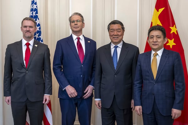 U.S. Secretary of the Treasury Scott Bessent, center left, U.S. Trade Representative Jamieson Greer, left, Chinese Vice Premier He Lifeng, center right, and Chinese ambassador to the World Trade Organization Li Chenggang, right, pose for a photo during a bilateral meeting between the United States and China, in Geneva, Switzerland, on Saturday, May 10, 2025. (Martial Trezzini/Keystone via AP)