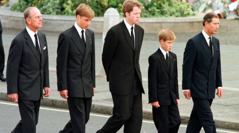 (L to R) The Duke of Edinburgh, Prince William, Earl Spencer, Prince Harry and Prince Charles walk outside Westminster Abbey during the funeral service for Diana, Princess of Wales, 06 September. Hundreds of thousands of mourners lined the streets of Central London to watch the funeral procession. The Princess died last week in a car crash in Paris. (Photo credit should read JEFF J. MITCHELL/AFP/Getty Images)