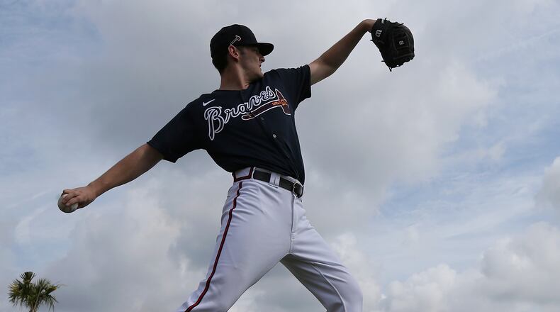 Braves pitching prospect Ian Anderson loosens up on a practice field Feb. 14, 2020, during spring training at CoolToday Park in North Port, Fla.