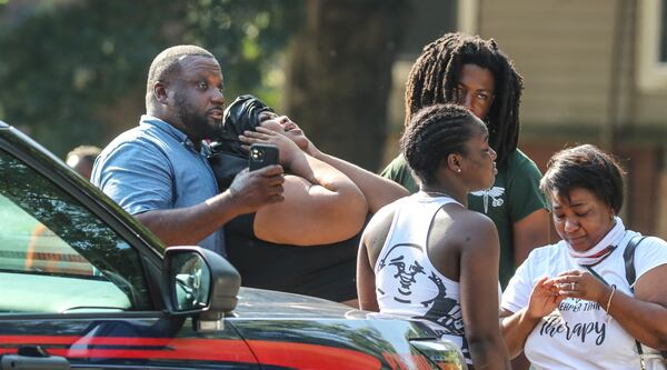 Friends and family members reacted to the news after an Atlanta mother was shot to death.