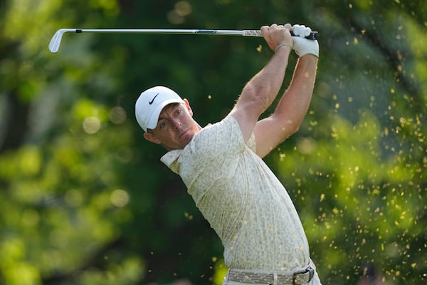 Rory McIlroy, of Northern Ireland, tees off on the 13th hole during the first round of the U.S. Open golf tournament at Oakmont Country Club Thursday, June 12, 2025, in Oakmont, Pa. (AP Photo/Carolyn Kaster)