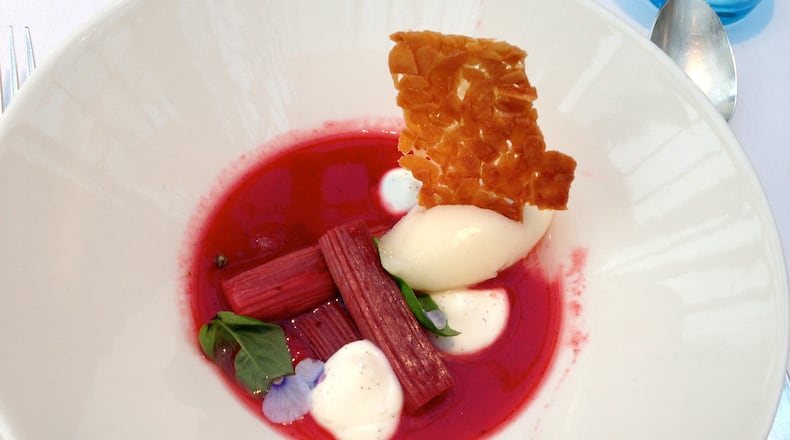 Poached rhubarb in a strawberry verbena soup with lemon sorbet