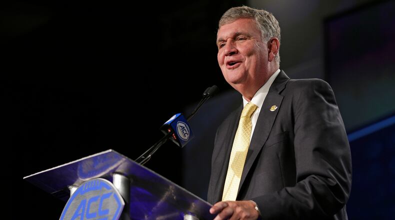 Georgia Tech head coach Paul Johnson speaks to the media during the recent ACC college football media days in Charlotte. (AP photo)