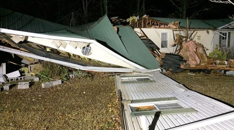 This Tuesday, Nov. 29, 2016 photo shows storm damage in the Arley area of Winston County, Ala. A suspected tornado killed multiple people in Alabama as a line of severe storms moved across the South overnight, authorities said. (Bill Castle/abc3340.com via AP)