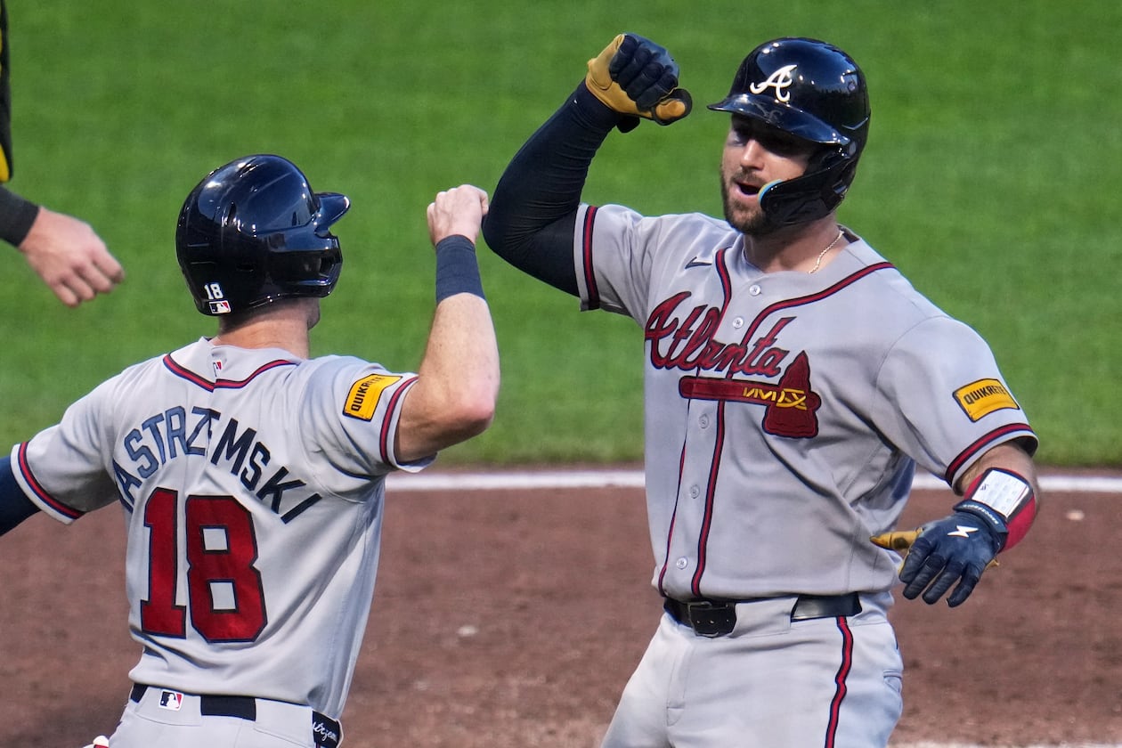 Atlanta Braves' Joey Bart, right, celebrates with Mike Yastrzemski as he returns to the dugout after hitting a two-run home run off Pittsburgh Pirates pitcher Dennis Santana during the eighth inning of a baseball game in Pittsburgh, Wednesday, July 8, 2026. (AP Photo/Gene J. Puskar)