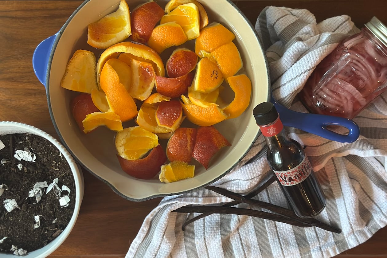 Don't throw that out! Those scraps can have new uses. From left: enriched potting soil with eggshells, citrus peel-infused simple syrup, homemade vanilla extract and pickle juice quick pickles. (Meridith Ford for the AJC)