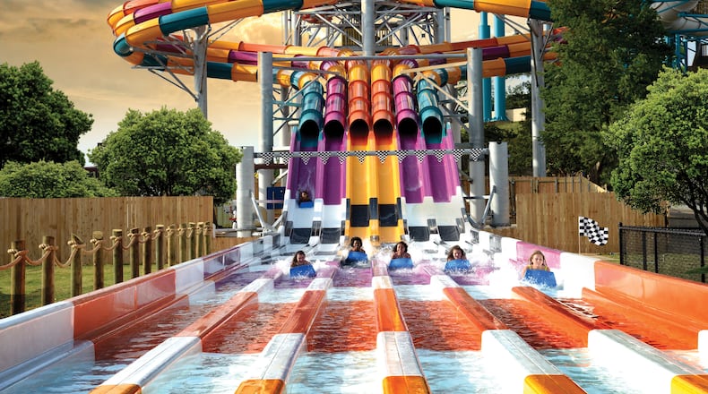 Wahoo Racer, a 60-foot-tall six-lane racing slide featuring twists and turns, is a popular ride at Six Flags White Water.