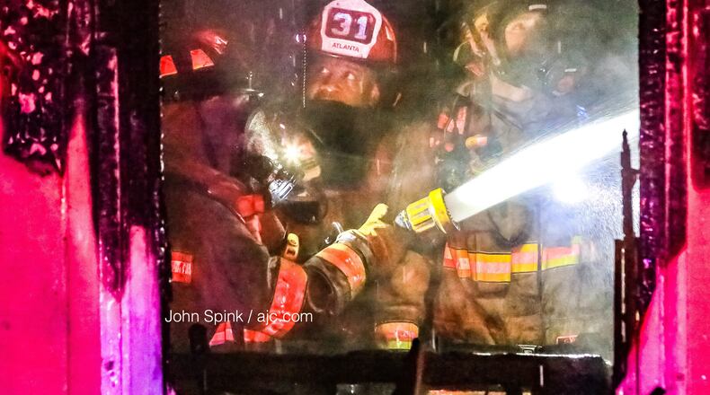 Atlanta fire crews battled a "pretty stubborn" fire early Monday morning. Three children and two adults were displaced.