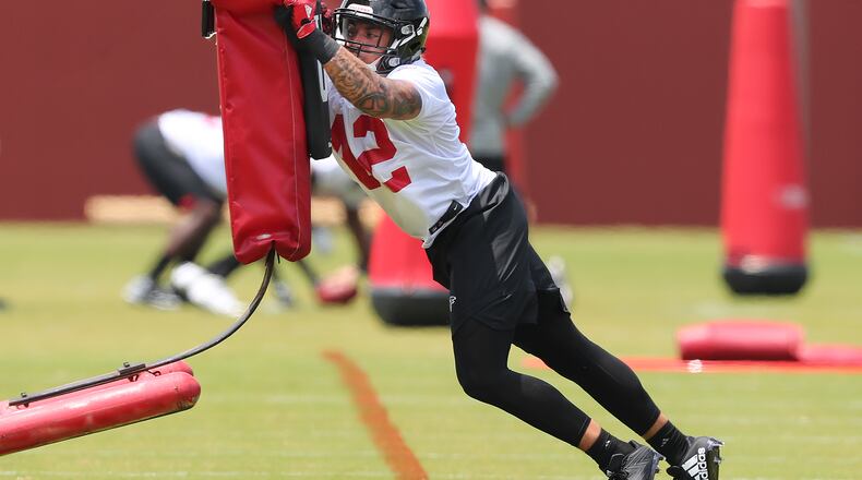 Flowery Branch: Falcons rookie linebacker Duke Riley, LSU, runs a drill with a tackling sled during rookie mini-camp on Friday, May 12, 2017, in Flowery Branch.    Curtis Compton/ccompton@ajc.com