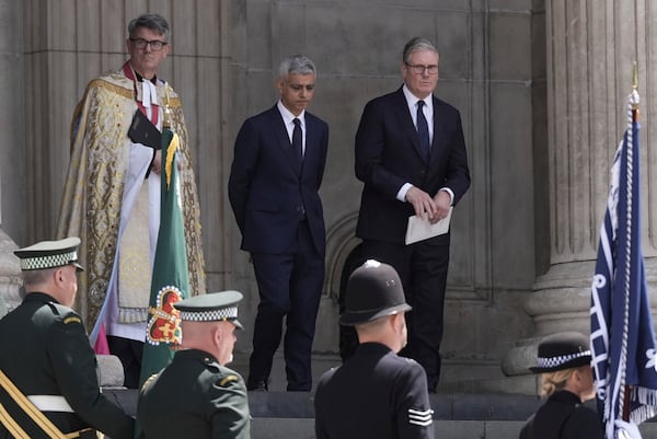 Mayor of London Sadiq Khan, left, and Britain's Prime Minister Keir Starmer depart following a special service at St Paul's Cathedral to mark the anniversary of the terrorist attacks in London July 7, 2005 that killed 52 people, in London, Monday July 7, 2025. (Stefan Rousseau/PA via AP)
