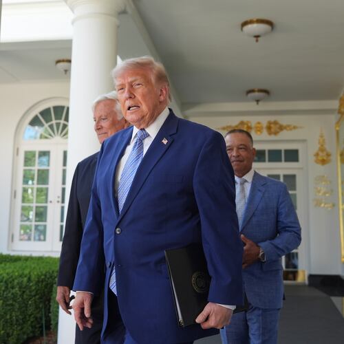 President Donald Trump arrives with Los Angeles Dodgers manager Dave Roberts and owner Mark Walter for an event to honor the 2025 World Series champions Los Angeles Dodgers in the Rose Garden of the White House, Thursday, July 23, 2026, in Washington. (AP Photo/Alex Brandon)