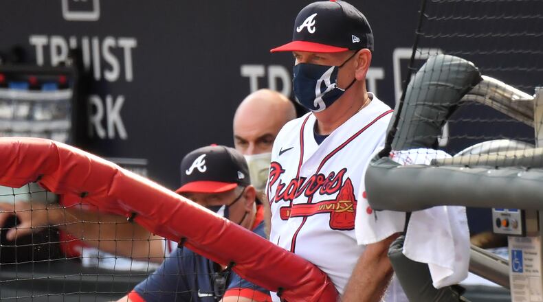 September 4, 2020 Atlanta - Atlanta Braves manager Brian Snitker watches from the dugout during the 4th inning of game one of MLB baseball doubleheader at Truist Park on Friday, September 4, 2020. Atlanta Braves won game one of baseball doubleheader 7-1 over the Washington Nationals. (Hyosub Shin / Hyosub.Shin@ajc.com)