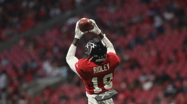 Atlanta Falcons wide receiver Calvin Ridley (18) makes a catch during open practice Sunday, July 29, 2018, at Mercedes-Benz Stadium in Atlanta.