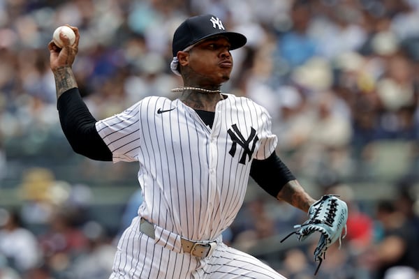 New York Yankees pitcher Marcus Stroman throws during the first inning of a baseball game against the Athletics, Sunday, June 29, 2025, in New York. (AP Photo/Adam Hunger)