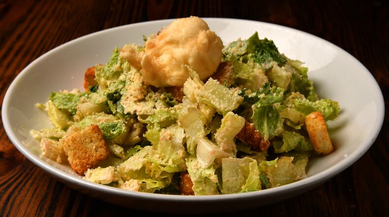 Cibo e Beve’s Caesar Salad. (CHRIS HUNT FOR THE ATLANTA JOURNAL-CONSTITUTION)