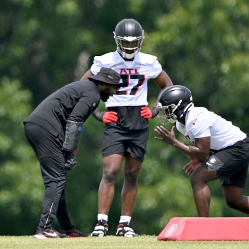 Atlanta Falcons edge rusher Jalon Walker (11) runs a drill as James Pearce Jr. (27) looks during the Atlanta Falcons Rookie Minicamp at the Atlanta Falcons Training Camp, Friday, May 9, 2025, in Flowery Branch. (Hyosub Shin/AJC)