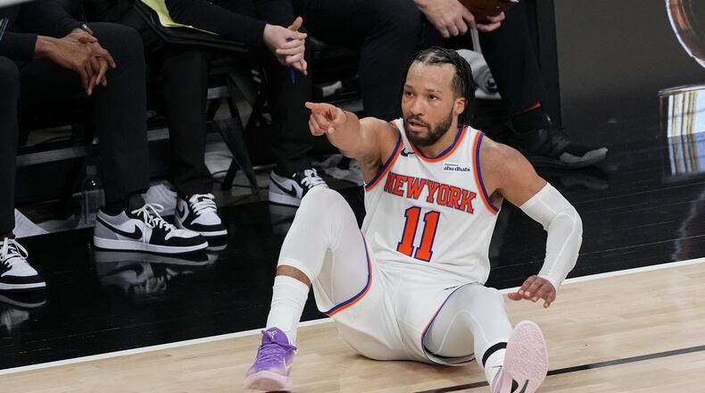 New York Knicks guard Jalen Brunson motion after a basket against the San Antonio Spurs during the second half of Game 1 of the NBA Finals basketball series, Wednesday, June 3, 2026, in San Antonio. (AP Photo/Eric Gay)
