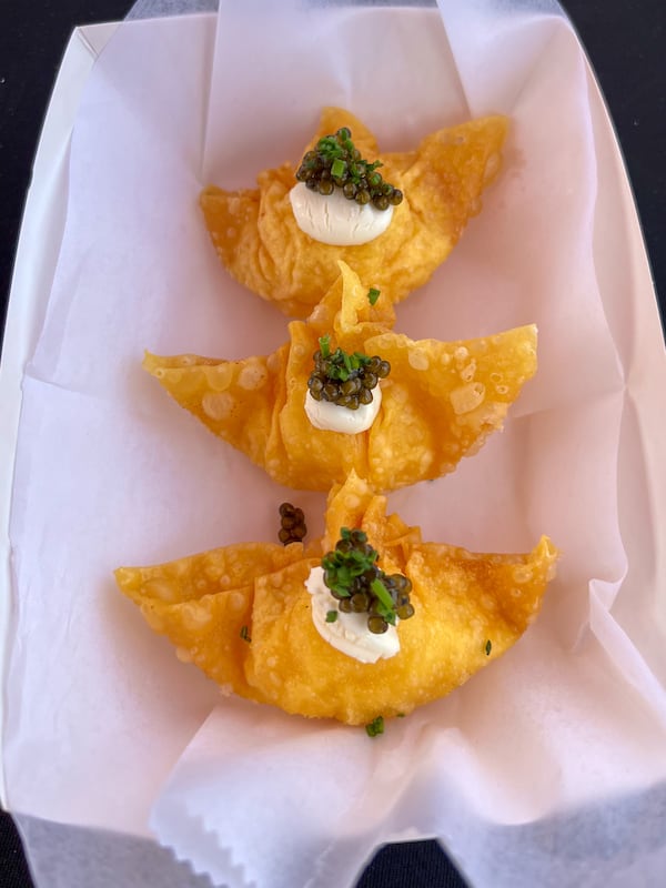 Smorgasburg will hold a Caviar Day on Saturday where participating vendors offer a menu item that involves caviar, like this crab rangoon. (Courtesy of Smorgasburg)