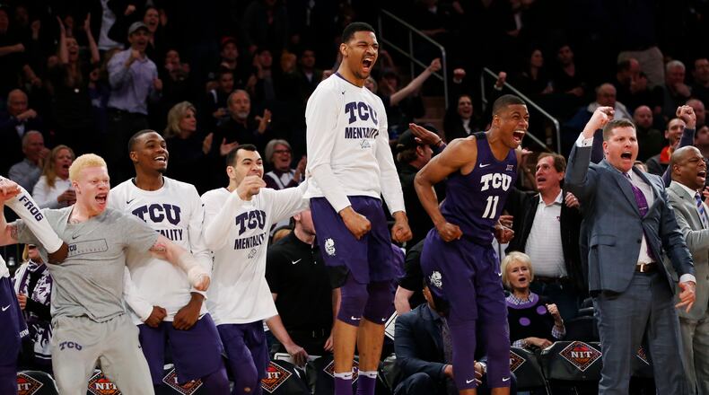 The TCU bench reacts against Central Florida during the second half of an NCAA college basketball game in the semifinals of the NIT Tuesday, March 28, 2017, in New York. (AP Photo/Kathy Willens)