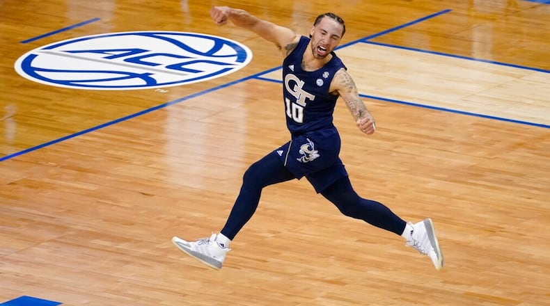 Georgia Tech guard Jose Alvarado (10) celebrates his team's 80-75 win over Florida State in the ACC Tournament championship game Saturday, March 13, 2021, in Greensboro, N.C. (Gerry Broome/AP)